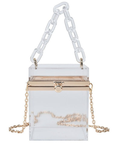 Clear Colored Square Acrylic Bag is a transparent square shaped box hand bag. In gorgeous colors. With hand chain & removeable crossbody silver chain. Special lock clasp. 
