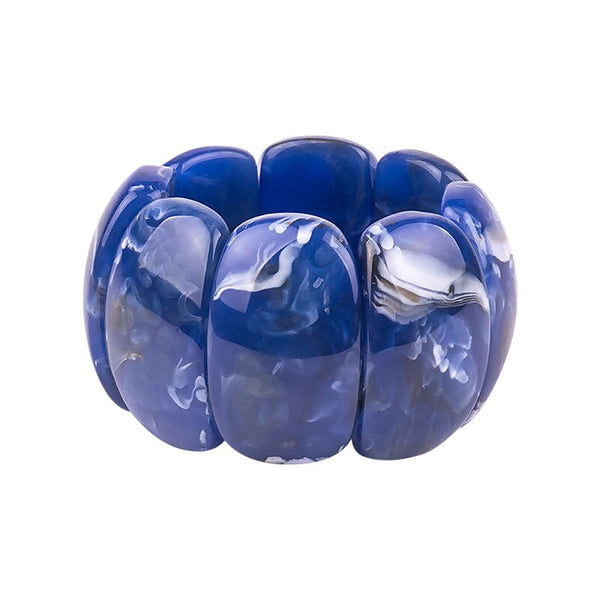 This Curve Rectangle Resin Cuff Stretch Bracelet is made of large curved beads. Based on a 50s retro cuff bracelet look. Each bead is regular and coloured both sides.