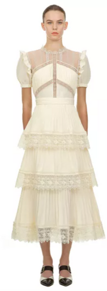 Sheer Lila Short Sleeve Ruffle Dress. Crafted with delicate lace and ruffles. The delicate fabric is soft and comfortable to wear. Lace vintage summer dress in off-white.