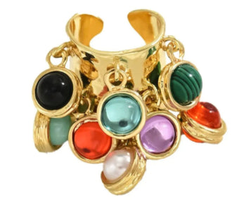 Add bold boho flair with this vintage-inspired open ring. Colorful acrylic beads, tassels & copper band. Adjustable fit for all-day comfort.