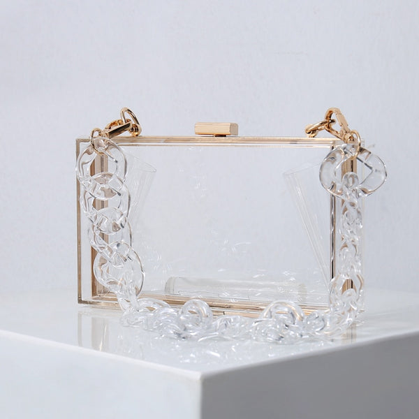 This Clear Colored Clutch Purse is an acrylic transparent box clutch. Being clear allows visibility to your mobile, glasses, lipstick, mirror. Both beautiufl and functional.