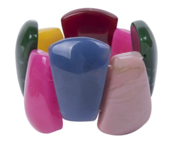 The stretch Resin Cuff Bracelet is a beaded, angular 50s retro bracelet that stretches to fit any hand. Elasticated for easy wear. Each bead is irregular and coloured both sides.