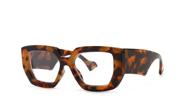 These Sera Vintage Square Big Frames are a must have. Transparent lens with large square vintage frames in black, redwood, leopard, beige and green. Two tone and block color. 