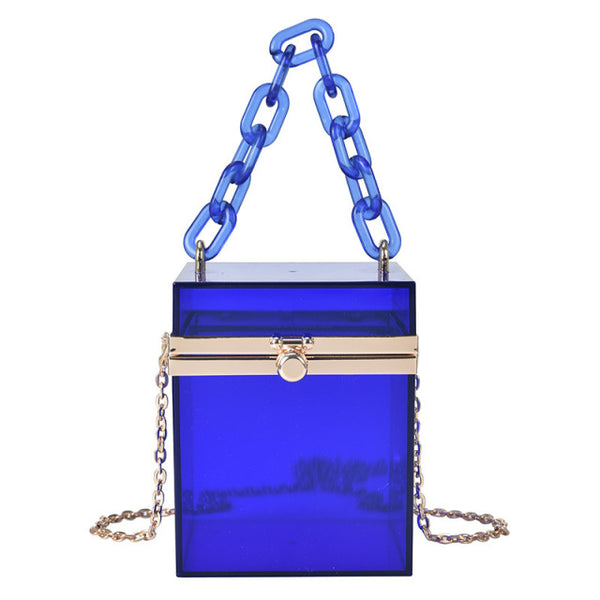 This Square Colored Acrylic Box Bag is very cool. It's a transparent acrylic square box tiny bag. In gorgeous colored acrylics. Also comes with hand chain and crossbody silver chain.