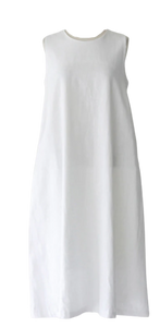 100% cotton white A-Line cut light, airy and roomy dress. You will love this sleeveless, Zana dress for Summer. It is 100% cotton so breathes. 