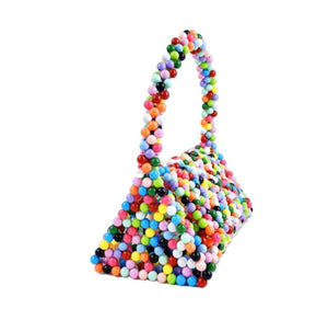 Petit Little Joy Beaded Bag for Mobiles and Makeup For anyone on-the-go! Sweet, color-blocked beaded small triangle bag.