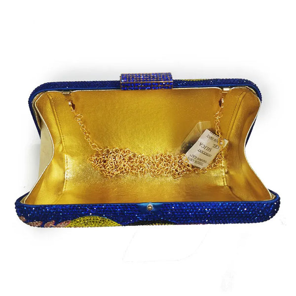 The Crystal Bird Clutch Purse is an mmbellished toucan parot clutch purse, covered with tiny colored crystal rhinestones. Finished with detail clasp closure.