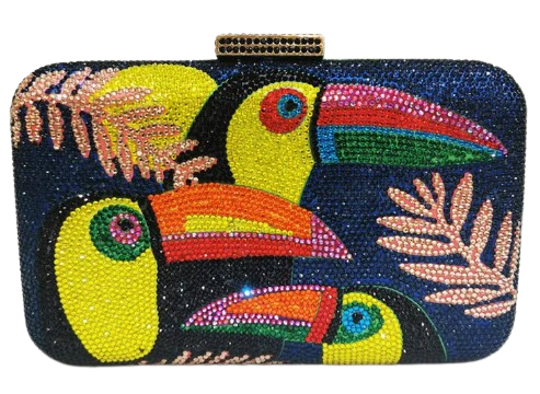 The Crystal Bird Clutch Purse is an mmbellished toucan parot clutch purse, covered with tiny colored crystal rhinestones. Finished with detail clasp closure.