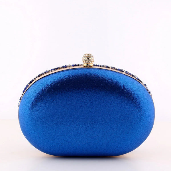 Sparkling oval rhinestone beaded clutch bag with glitter finish, clasp closure & chain strap. Perfect for weddings, prom, parties & evening events.