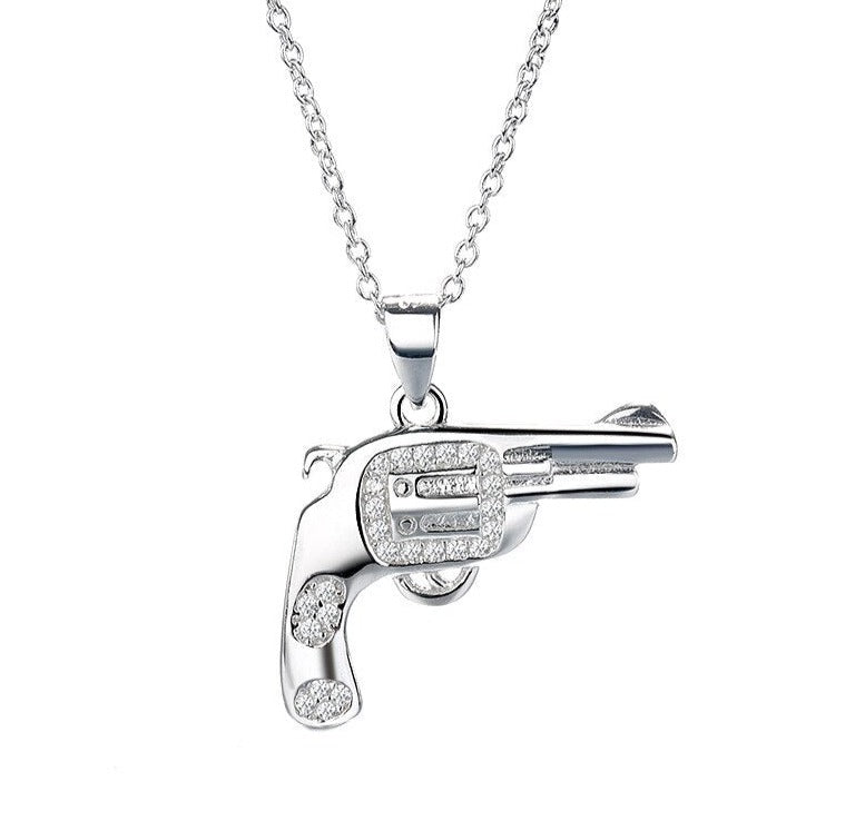 This Baby Pistol Necklace will give you the subtle edge in any environment. Gunning it at work or play. Bang! Bang! With tiny diamante detail with metal silver 925.