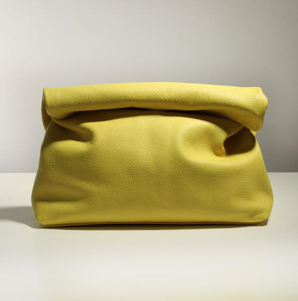 Stunning yellow soft genuine leather folded envelope day clutch bag. A range of gorgeous colours including apple green, lilac, turquoise beige, tan and silver grey.