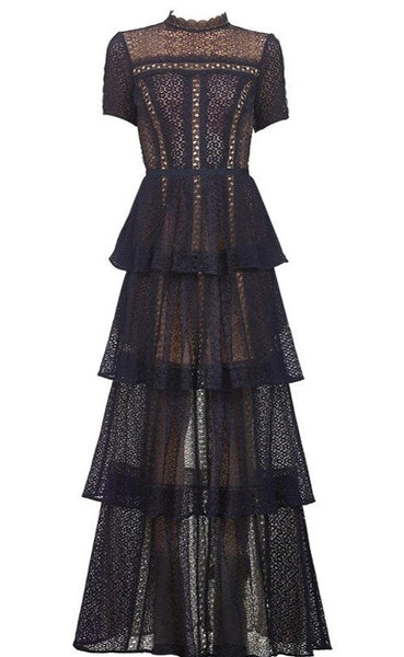 This Shamala Mermaid Long Lace Dress in navy, is sure to make a statement. Crafted with navy lace, this long vintage dress features four rows of ruffles. 