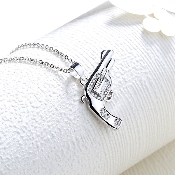 This Baby Pistol Necklace will give you the subtle edge in any environment. Gunning it at work or play. Bang! Bang! Tiny diamante detail with metal silver 925.