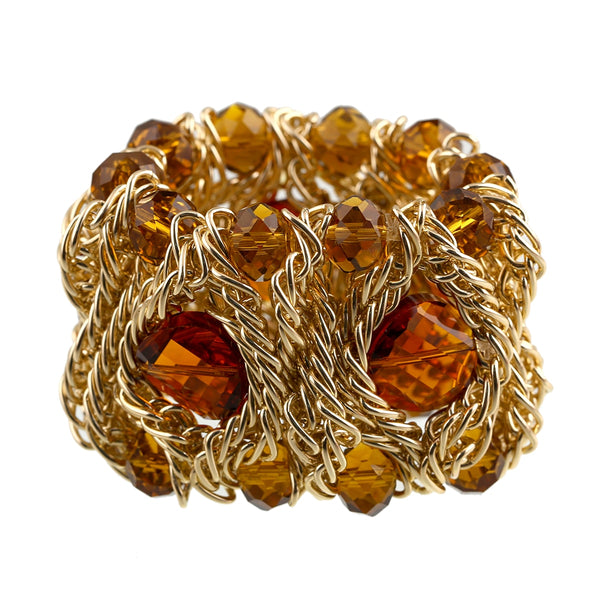 Treasure Cocktail Cuff Bracelet features elastic, soft, lightly woven alloy. It is encrusted with tiny multicolored crystal glass beads. A bohemian statement charm bracelet. 