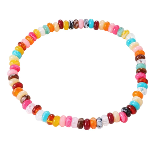 A colorful beaded necklace made of small, glossy, disc-shaped beads in a variety of colors including pink, orange, yellow, blue, red, brown, and white, arranged in a circle on a plain white background.