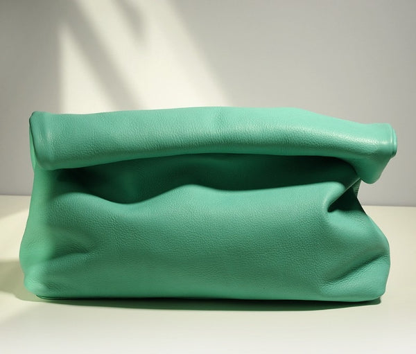 Stunning green soft genuine leather folded envelope day clutch bag. A range of gorgeous colours including apple green, lilac, turquoise beige, tan and silver grey.