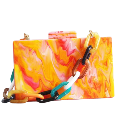 Marble Hot Orange Clutch acrylic box will fit your cards, make up + mobile phone.  Rectangular in shape. Cotton lining and various chain straps for cross body wear.