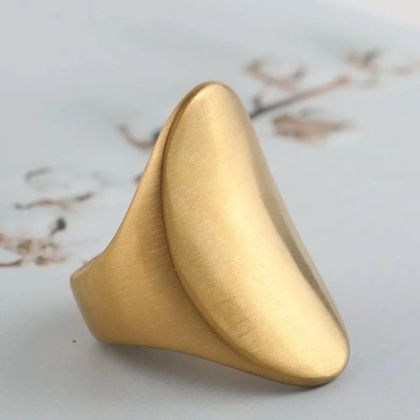 This Large Square Brushed Metal Ring adds a unique punk cocktail look. Its metal construction is strong and durable. The brushed finish gives it cool matte look. 