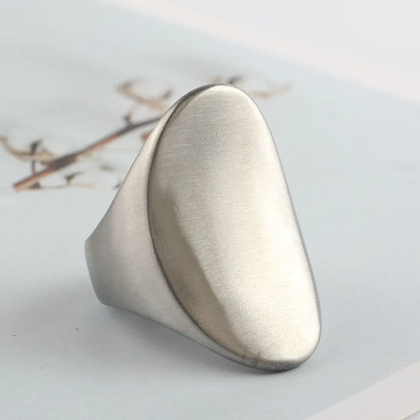 This Large Square Brushed Metal Ring adds a unique punk cocktail look. Its metal construction is strong and durable. The brushed finish gives it cool matte look. 