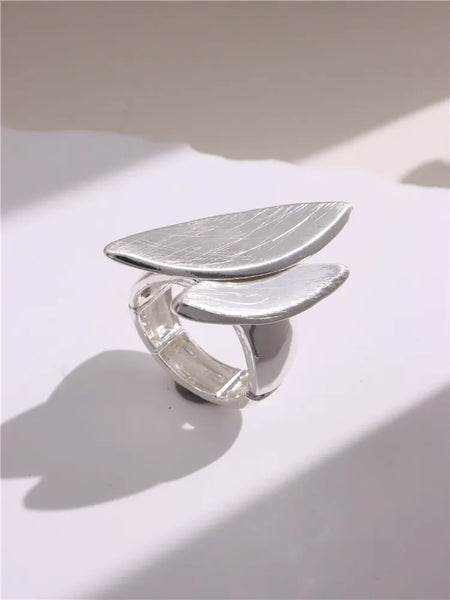Light Large Silver and Gold Geometric Ring comes in a variety of shapes and designs. Crafted with titanium steel and a contemporary geometric design. One size.