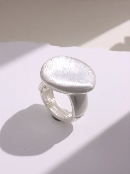 Light Large Silver and Gold Geometric Ring comes in a variety of shapes and designs. Crafted with titanium steel and a contemporary geometric design. One size.