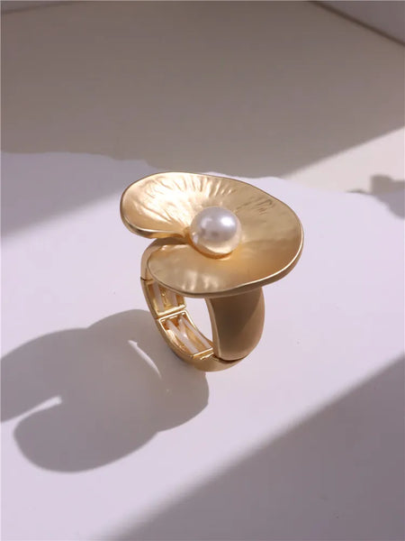 Light Large Silver and Gold Geometric Ring comes in a variety of shapes and designs. Crafted with titanium steel and a contemporary geometric design. One size.