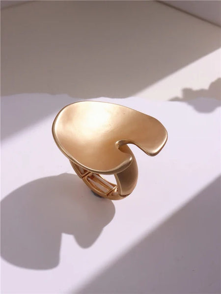 Light Large Silver and Gold Geometric Ring comes in a variety of shapes and designs. Crafted with titanium steel and a contemporary geometric design. One size.