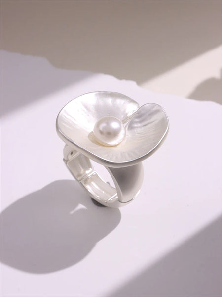 Light Large Silver and Gold Geometric Ring comes in a variety of shapes and designs. Crafted with titanium steel and a contemporary geometric design. One size.