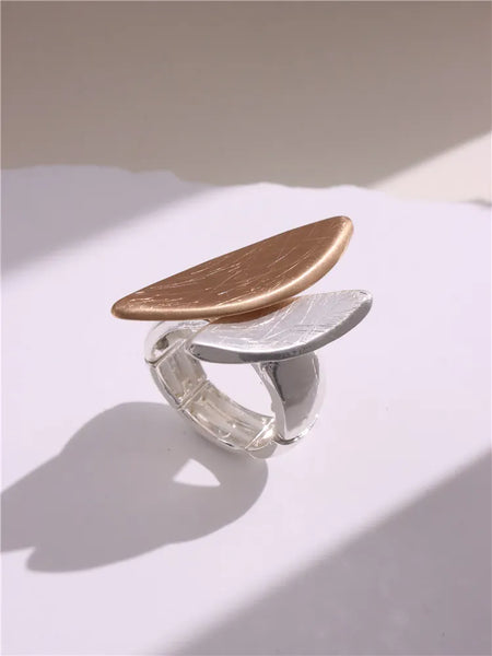 Light Large Silver and Gold Geometric Ring comes in a variety of shapes and designs. Crafted with titanium steel and a contemporary geometric design. One size.