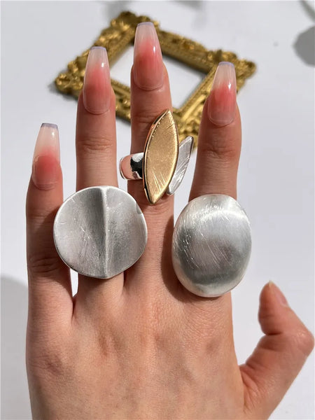 Light Large Silver and Gold Geometric Ring comes in a variety of shapes and designs. Crafted with titanium steel and a contemporary geometric design. One size.