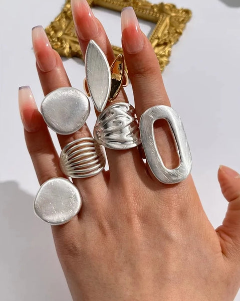Light Large Silver and Gold Geometric Ring comes in a variety of shapes and designs. Crafted with titanium steel and a contemporary geometric design. One size.