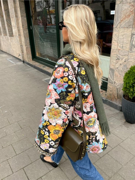 The Merry Flower Quilt Bomber Jacket is the perfect garment for cooler days. 