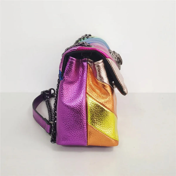 New Wave Rainbow Bag is a multicoloured PU leather bag, featuring wide diagonal metallic pastel stripes.  Foldover top, a chain shoulder strap and eagle head clasp.