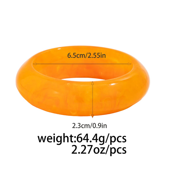 Silver, Orange, Light Blue, Gold and Clear Geometric Bangle perfect for making a statement. The design features a unique geometric shape. Constructed from high-quality resin &amp; zinc alloy that is lightweight and durable