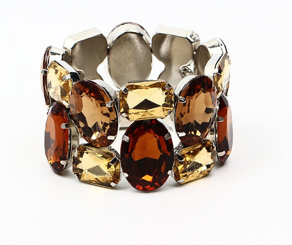 Wild Rhinestone Bracelet is a cuff dress, stretch resin beaded angular 50s retro bracelet, which stretches to fit any hand. Elasticated for easy wear. Colorful shiny beads.