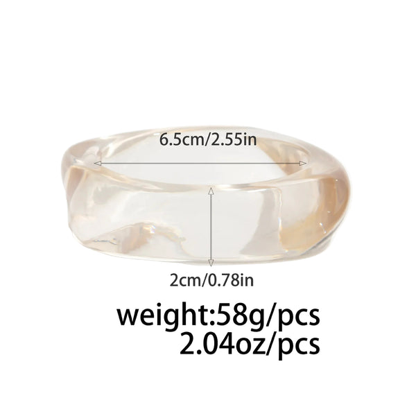 Silver, Orange, Light Blue, Gold and Clear Geometric Bangle perfect for making a statement. The design features a unique geometric shape. Constructed from high-quality resin &amp; zinc alloy that is lightweight and durable