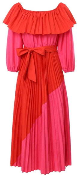 Sash waisted, lantern sleeve brightly hued hot pink and red full circle, pleated crepe skirt dress. Neck wide for off shoulder.