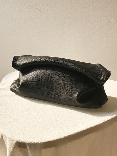 Stunning black soft genuine leather folded envelope day clutch bag. A range of gorgeous colours including apple green, lilac, turquoise beige, tan and silver gray.