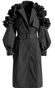 This has to be the ultimate trench coat. It has mulitple frill pleats, that fan out and cascades down both arms. Nothing can stand next to this piece of art. In Black & Hazelnut.