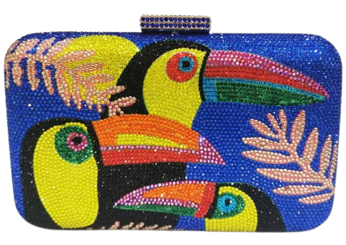 The Crystal Bird Clutch Purse is an mmbellished toucan parot clutch purse, covered with tiny colored crystal rhinestones. Finished with detail clasp closure.