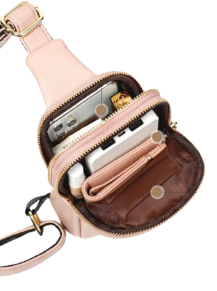 Mini Leather Crossbody Strap Bag can be worn front or back. It is a slimline, high quality leatherette crossbody bag. Beautifully soft to touch, fully lined with pockets.