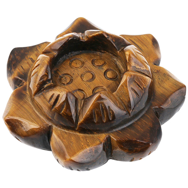 Crafted natural quartz crystal lotus flower shaped candle holder. Variety of colors. For meditation and interior decoration, home design. Tigers eye.