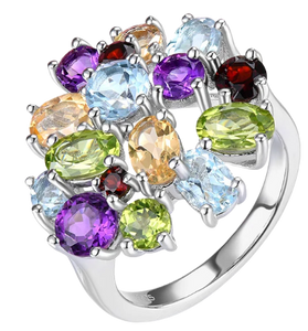 The Dream Gem Ring is a delightful multi colored gemstone silver cluster ring. It includes a halo of Blue Topaz, Green Peridot, Garnet, Yellow Citrine, Amethyst and Pale Aquamarine.