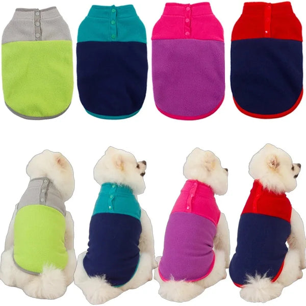 Four small dogs wearing fleece pet jackets in different color combinations: lime green and gray, teal and navy, pink and navy, and red and navy, shown against a plain white background.