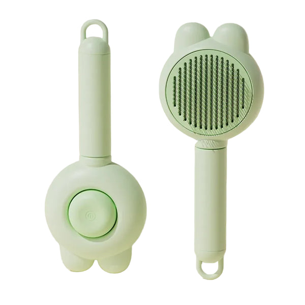 Two green pet grooming tools on a beige background