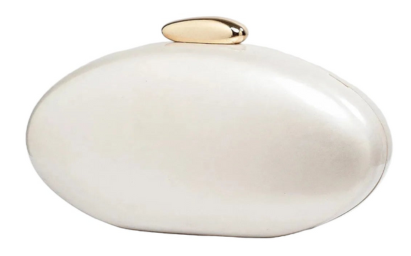 White oval object with a gold top on a white background