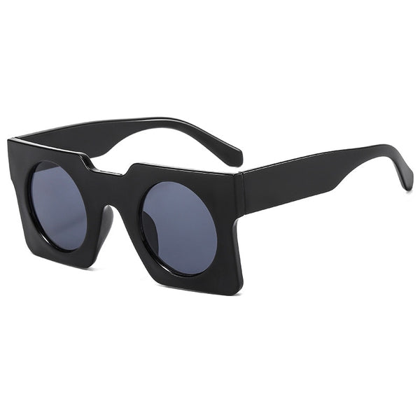 Pluto Square Sunglasses. Very retro, Italian 50s. Surreal and sassy.  You want to  get your hands on these boxy, looking glasses.