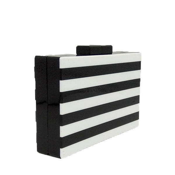 This gorgeous black and white Stripe Clutch Bag is a rectangle, box clutch purse. Versatile and striking. Also comes with a detachable, long, silver cross body chain. 