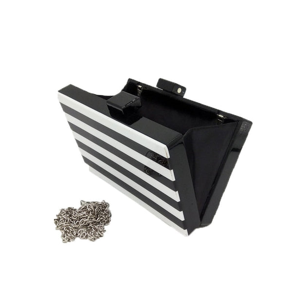 This gorgeous black and white Stripe Clutch Bag is a rectangle, box clutch purse. Versatile and striking. Also comes with a detachable, long, silver cross body chain. 