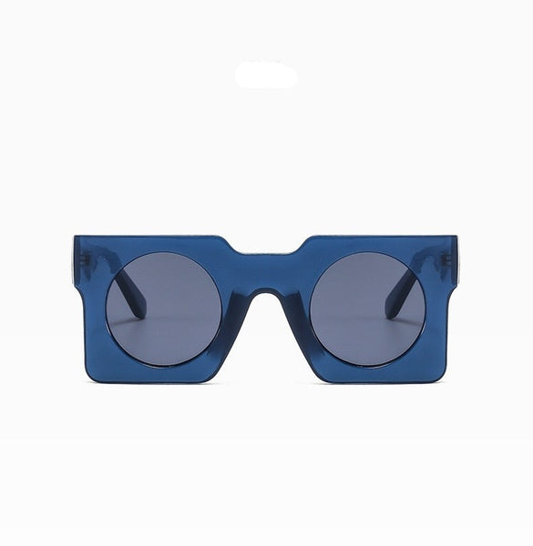 Pluto Square Sunglasses. Very retro, Italian 50s. Surreal and sassy.  You want to  get your hands on these boxy, looking glasses.